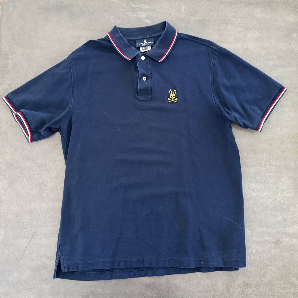 Psycho Bunny Dark Blue Polo with Red and White Trim